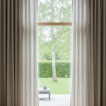 Buede vinduer: Find de perfekte gardiner – En komplet guide